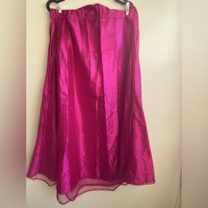 Magenta Satin skirt/Lehenga with a net layer.